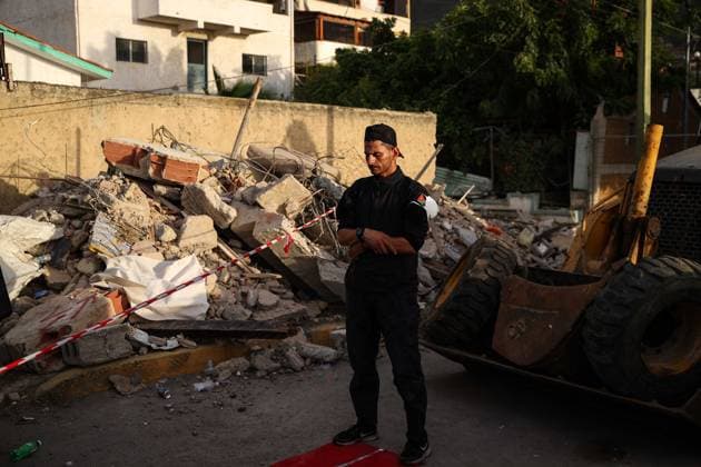 Search and rescue operations continue in Earthquake-hit Venezuela LA GUAIRA, VENEZUELA - JUNE 29: A member of a search and rescue team performs prayer on a rug next to debris from collapsed buildings in the Carabellada and Caribe neighborhoods following powerful earthquakes in La Guaira, Venezuela on June 29, 2026. Cem Tekkesinoglu Anadolu La Guaira Venezuela. Editorial use only. Please get in touch for any other usage.  Copyright: x2026xAnadoluxCemxTekkesinoglux
