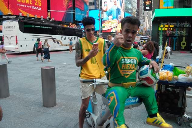June 29, 2026, New York, United States: Fans of the Brazilian soccer team sit on a bicycle in Times Square, Manhattan, New York City. New York United States - ZUMAs197 20260629_aaa_s197_141 Copyright: xJiminxKimx
