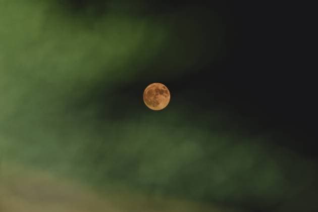 India: Strawberry Moon Rises over Kashmir The June full moon, also known as the Strawberry moon , appears in the evening sky in Srinagar. Srinagar Jammu and Kashmir India Copyright: MubashirxHassan