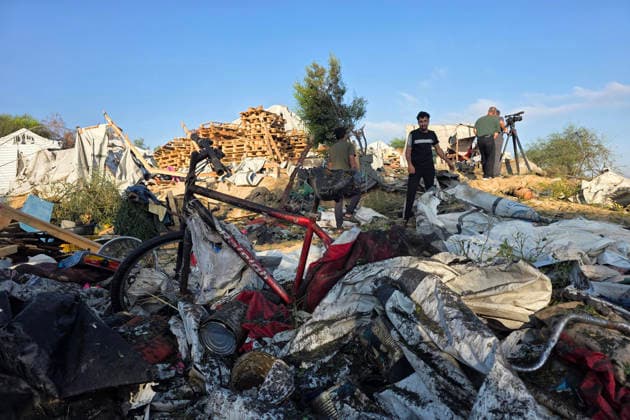 Displaced Families Inspect Damage After Israeli Airstrike in al-Mawasi Palestinian displaced families inspect damage to their tents and belongings following an Israeli airstrike that targeted a camp for displaced people in the al-Mawasi area of Khan Younis, southern Gaza Strip, on June 30, 2026. The Israeli army carried out the strike despite a ceasefire, causing extensive damage across the area. Photo by Tariq Mohammad APA Images Khan Yunis Gaza Strip Palestinian Territory 300626_Khan_Yunis_TM_00(42) Copyright: xapaimagesxTariqxMohammad xapaimagesx