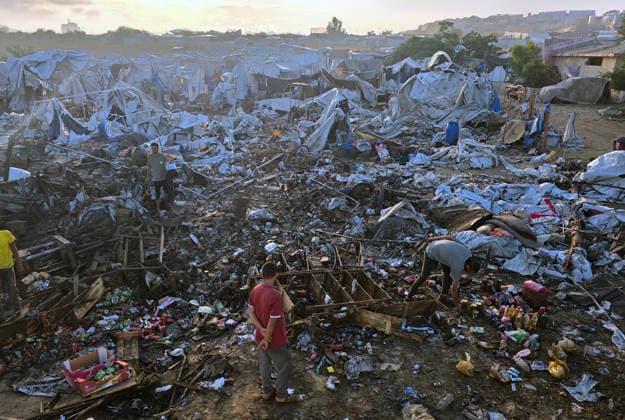 Displaced Families Inspect Damage After Israeli Airstrike in al-Mawasi Palestinian displaced families inspect damage to their tents and belongings following an Israeli airstrike that targeted a camp for displaced people in the al-Mawasi area of Khan Younis, southern Gaza Strip, on June 30, 2026. The Israeli army carried out the strike despite a ceasefire, causing extensive damage across the area. Photo by Tariq Mohammad APA Images Khan Yunis Gaza Strip Palestinian Territory 300626_Khan_Yunis_TM_00(3) Copyright: xapaimagesxTariqxMohammad xapaimagesx