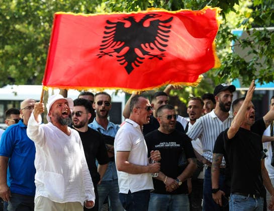 June 30, 2026, Tirana, Tirana, Albania: Protesters shout anti Government slogans during a protest in front of Albanian Parliament asking resignation of Albanian Prime Minister Edi Rama and of his Government here in Tirana, Albania, on 30 June 2026. Tirana Albania - ZUMAb266 20260630_zip_b266_001 Copyright: xArmandoxBabanix
