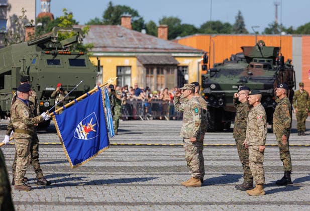 Valga, 30.06.2026. The 1 German Netherlands Corps (1GNC) officially assume tactical command of the Estonian and Latvian land forces from Multinational Corps Northeast. The ceremony was held on Valga Central Square. The ceremony was attended by Estonian Minister of Defence Hanno Pevkur, German Minister of Defence Boris Pistorius, Dutch Minister of Defence Dilan Yesilgöz, Latvian Minister of Defence Raivis Melnis, as well as senior military leaders from NATO and member states. Photo Arvo Meeks, Louna-Eesti Postimees Valga Valgamaa Estonia 2MA30juuni2026A013  Copyright: xArvoxMeeksx Flag presentation ceremony