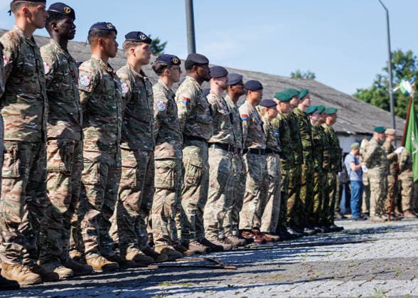 Valga, 30.06.2026. The 1 German Netherlands Corps (1GNC) officially assume tactical command of the Estonian and Latvian land forces from Multinational Corps Northeast. The ceremony was held on Valga Central Square. The ceremony was attended by Estonian Minister of Defence Hanno Pevkur, German Minister of Defence Boris Pistorius, Dutch Minister of Defence Dilan Yesilgöz, Latvian Minister of Defence Raivis Melnis, as well as senior military leaders from NATO and member states. Photo Arvo Meeks, Louna-Eesti Postimees Valga Valgamaa Estonia 2MA30juuni2026A030  Copyright: xArvoxMeeksx Group of soldiers lined up