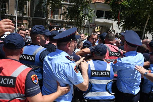 Protest held in front of Parliament building against tourism projects in Tirana TIRANA, ALBANIA - JUNE 30: Demonstrators gather in front of the Parliament building to protest against a planned tourism project in the Zvernec area of Vlora, in Tirana, Albania on June 30, 2026. Scuffles broke out between police and protestors during the demonstration, which has been ongoing for a month. Reinforcements arrived at the protest area to form a security cordon. Olsi Shehu Anadolu Tirana Albania. Editorial use only. Please get in touch for any other usage.  Copyright: x2026xAnadoluxOlsixShehux