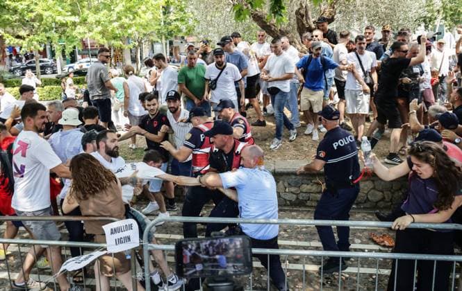 Police and Protesters Clash Outside Albanian Parliament TIRANA, ALBANIA JUNE 30, 2026: Demonstrators gathered outside the Albanian Parliament in Tirana during a new phase of the ongoing protests against a proposed luxury tourism development project linked to Jared Kushner. Protesters confronted lawmakers as they arrived for and departed from the parliamentary session, chanting slogans accusing members of parliament of failing to represent citizens and throwing eggs toward official vehicles. Police intervened after tensions escalated, using pepper spray and detaining several demonstrators during brief clashes outside the parliament building. The protest movement later continued with its daily evening demonstration outside the Prime Minis Copyright: x xVlasovxSulajx xJNAxPressx