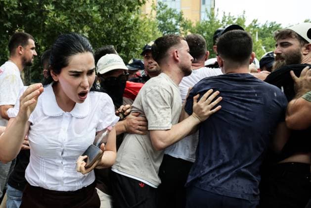Police and Protesters Clash Outside Albanian Parliament TIRANA, ALBANIA JUNE 30, 2026: Demonstrators gathered outside the Albanian Parliament in Tirana during a new phase of the ongoing protests against a proposed luxury tourism development project linked to Jared Kushner. Protesters confronted lawmakers as they arrived for and departed from the parliamentary session, chanting slogans accusing members of parliament of failing to represent citizens and throwing eggs toward official vehicles. Police intervened after tensions escalated, using pepper spray and detaining several demonstrators during brief clashes outside the parliament building. The protest movement later continued with its daily evening demonstration outside the Prime Minis Copyright: x xVlasovxSulajx xJNAxPressx