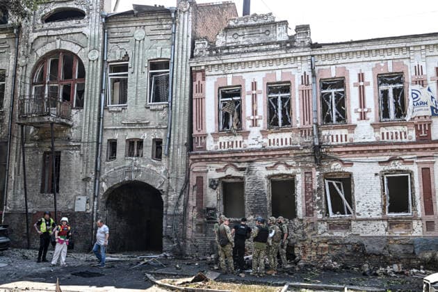 Law enforcers and EOD experts work outside old buildings damaged by a Russian drone strike, Zaporizhzhia, Ukraine, June 30, 2026. On Tuesday, June 30, a Russian drone struck Zaporizhzhia, hitting the historic part of the city and damaging cultural heritage sites of local importance. The blast wave damaged cars, the Leshchynskyi House, the Zaporizhzhia Choral Synagogue (Leshchynskyi Synagogue), and the Pashutin family house. (Photo by Dmytro Smolienko Ukrinform) Russian attack historical centre of Zaporizhzhia with drone  Copyright: xDmytroxSmolienkox