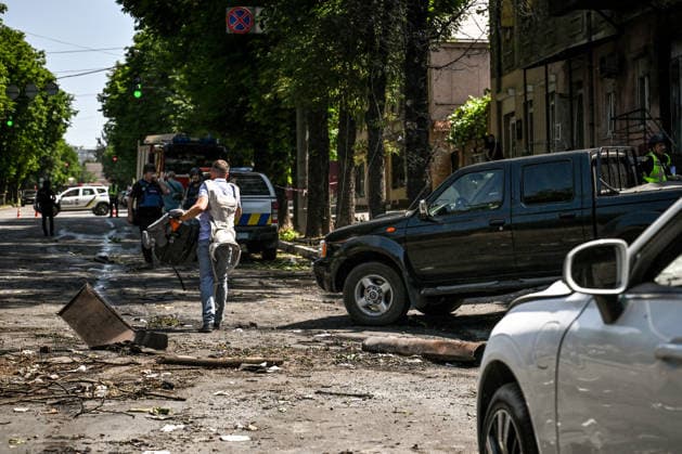 A man walks along a street after a Russian drone strike, Zaporizhzhia, Ukraine, June 30, 2026. On Tuesday, June 30, a Russian drone struck Zaporizhzhia, hitting the historic part of the city and damaging cultural heritage sites of local importance. The blast wave damaged cars, the Leshchynskyi House, the Zaporizhzhia Choral Synagogue (Leshchynskyi Synagogue), and the Pashutin family house. (Photo by Dmytro Smolienko Ukrinform) Russian attack historical centre of Zaporizhzhia with drone  Copyright: xDmytroxSmolienkox