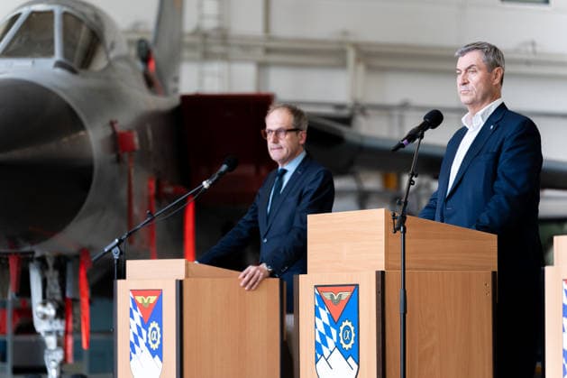 Kaufbeuren, Bavaria, Germany - June 30, 2026: Kaufbeuren Air Base, the Bundeswehr, and the German Air Force: The Future of the Arrow Weapon System for Germany (AWS-G), Air Defense, Military Base, and Pilot Project for Historic Preservation. Director General Dr. Alexander Götz (Head of the Force Development Division at the Federal Ministry of Defense) and Minister President Dr. Markus Söder (CSU) in front of a Panavia 200 (PA-200) Tornado fighter jet, combat jet *** Fliegerhorst Kaufbeuren, Bundeswehr und Luftwaffe: Zukunft des Arrow Weapon System for Germany (AWS-G), Luftverteidigung, Militärstandort und Pilotvorhaben Denkmalschutz. Ministerialdirektor Dr. Alexander Götz (Hauptabteilungsleiter Aufwuchs im Bundesministerium der Verteidig