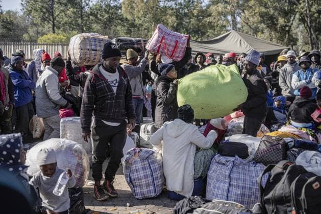 Migrants seek repatriation at Malawi Consulate in Johannesburg after unrest JOHANNESBURG, SOUTH AFRICA - JUNE 30: A group of Malawian undocumented migrants gather in front of the Malawian Consulate building to prepare for their return home by buses following a resurgence of xenophobic attacks and anti-migrant protests in Johannesburg, South Africa on June 30, 2026. Ihsaan Haffejee Anadolu Johannesburg South Africa. Editorial use only. Please get in touch for any other usage.  Copyright: x2026xAnadoluxIhsaanxHaffejeex