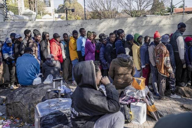 Migrants seek repatriation at Malawi Consulate in Johannesburg after unrest JOHANNESBURG, SOUTH AFRICA - JUNE 30: A group of Malawian undocumented migrants gather in front of the Malawian Consulate building to prepare for their return home by buses following a resurgence of xenophobic attacks and anti-migrant protests in Johannesburg, South Africa on June 30, 2026. Ihsaan Haffejee Anadolu Johannesburg South Africa. Editorial use only. Please get in touch for any other usage.  Copyright: x2026xAnadoluxIhsaanxHaffejeex