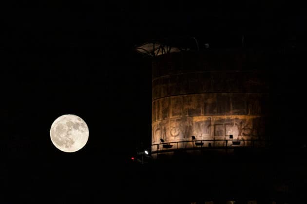 June 30, 2026, Limassol, Limassol, Cyprus: The Strawberry moon is seen rising next to a water tower in, Limassol, Cyprus, on Jun. 30, 2026. Limassol Cyprus  - ZUMAp215 20260630_zip_p215_002 Copyright: xKostasxPikoulasx
