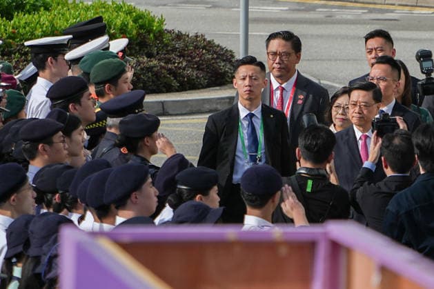 HONG KONG-DAILY HKSAR-ANNIVERSARY Chief Executive John Lee Ka-chiu inspects members of uniformed groups during the flag-raising ceremony to mark the 29th anniversary of the establishment of the Hong Kong Special Administrative Region (HKSAR) at Golden Bauhinia Square on July 1, 2026 in Hong Kong. (Photo by Kevin Li TMHK via Nexpher Images) Hong Kong