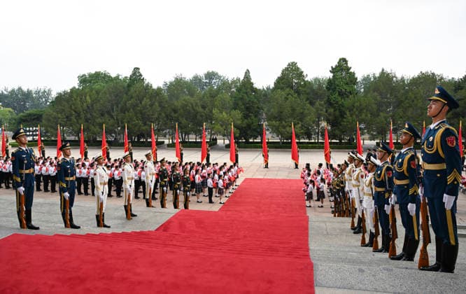 (260701) -- BEIJING, July 1, 2026 -- Honor guards and children are pictured outside the Great Hall of the People in Beijing, capital of China, July 1, 2026. China will hold a gathering to celebrate the 105th founding anniversary of the Communist Party of China (CPC) at 10 a.m. Wednesday at the Great Hall of the People in Beijing. ) CHINA-BEIJING-CPC-105TH FOUNDING ANNIVERSARY-CELEBRATION (CN) ZhangxLing 