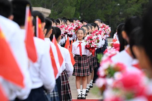 (260701) -- BEIJING, July 1, 2026 -- Children are seen outside the Great Hall of the People in Beijing, capital of China, July 1, 2026. China will hold a gathering to celebrate the 105th founding anniversary of the Communist Party of China (CPC) at 10 a.m. Wednesday at the Great Hall of the People in Beijing. ) CHINA-BEIJING-CPC-105TH FOUNDING ANNIVERSARY-CELEBRATION (CN) ZhangxLing 