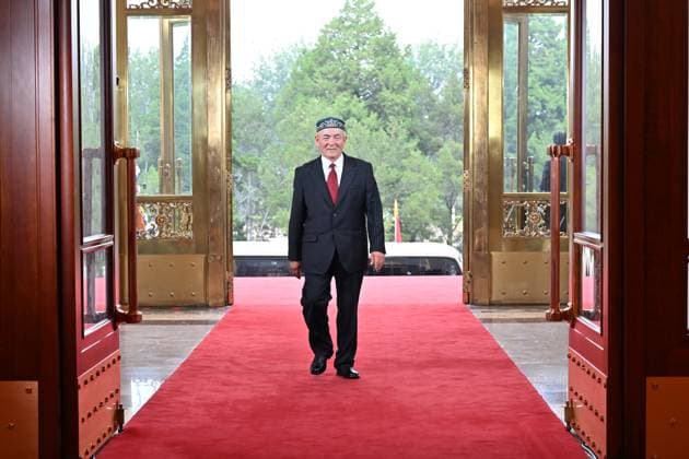 (260701) -- BEIJING, July 1, 2026 -- Uhas Sulayman, recipient of the July 1 Medal, enters the Great Hall of the People in Beijing, capital of China, July 1, 2026. A gathering in celebration of the 105th founding anniversary of the Communist Party of China (CPC) started at the Great Hall of the People on Wednesday morning in central Beijing. ) CHINA-BEIJING-CPC-105TH FOUNDING ANNIVERSARY-CELEBRATION (CN) YinxBogu 