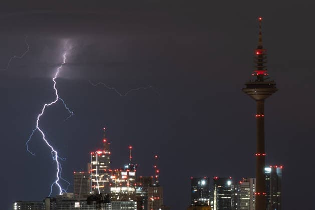 July 1, 2026, Frankfurt, Hesse, Germany: Lightning strikes over the skyline of the financial district in Frankfurt am Main, Germany. Frankfurt Germany - ZUMAb332 20260701_zip_b332_002 Copyright: xMatiasxBasualdox