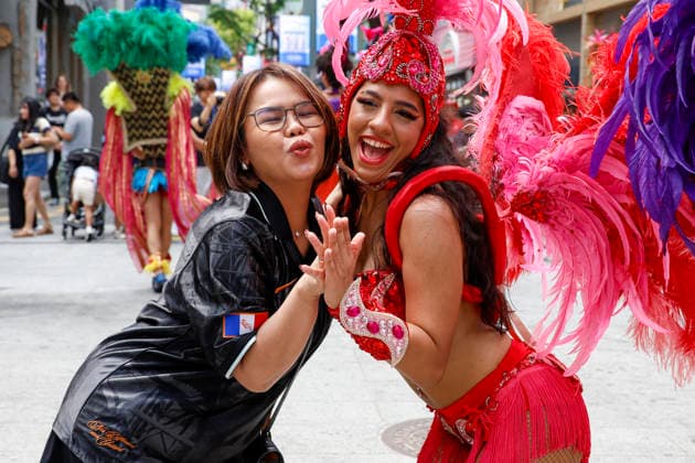 Dancers perform samba show summer festival in Seoul Dancers from Lotte World, a South Korean theme park, pose for photos with visitors after performing a samba show during a summer festival promotional event in the Myeongdong shopping district in Seoul, South Korea, on July 01, 2026. Seoul South Korea  Copyright: xMatrixxImagesx xJungxUi-Chelx