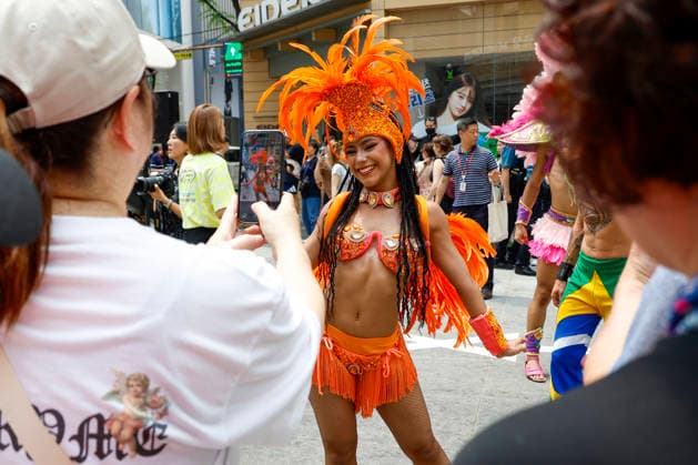Dancers perform samba show summer festival in Seoul Dancers from Lotte World, a South Korean theme park, pose for photos with visitors after performing a samba show during a summer festival promotional event in the Myeongdong shopping district in Seoul, South Korea, on July 01, 2026. Seoul South Korea  Copyright: xMatrixxImagesx xJungxUi-Chelx