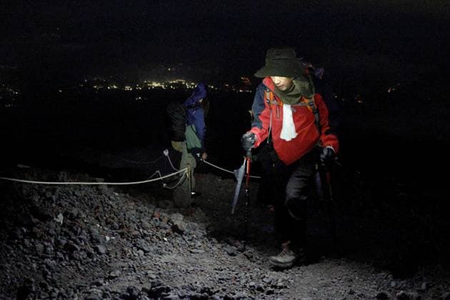 Mt. Fuji climbing season Climbers head to the top of Mt. Fuji along the Yoshida route in Yamanashi Prefecture on July 1, 2026. The route, as well as the Subashiri route in Shizuoka Prefecture, opened the same day for the start of the official climbing season through Sept. 10.  A14AA0005621134P