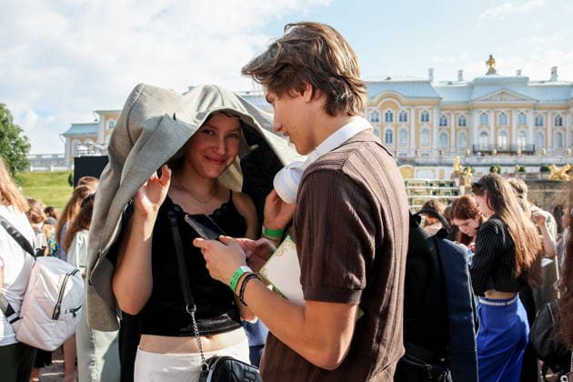 RUSSIA, ST PETERSBURG - JUNE 30, 2026: Young people attend an annual ball held at the Peterhof State Museum Reserve for school leavers awarded gold medals for academic excellence. Peter Kovalev TASS  94534801