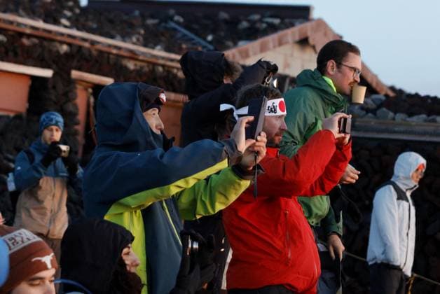 Mt. Fuji climbing season Climbers atop Mt. Fuji take photos of the rising sun on July 1, 2026, as the official climbing season began for Japan s highest mountain, straddling Shizuoka and Yamanashi prefectures.  A14AA0005621136P