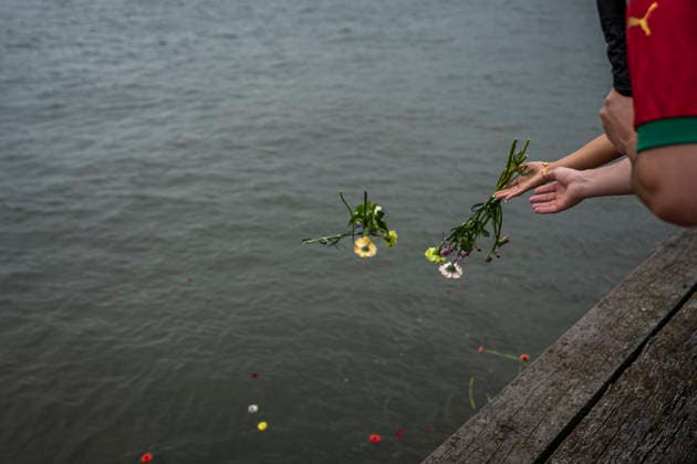 June 30, 2026, Rotterdam, South Holland, Netherlands: 30 June 2026, Rotterdam, the Netherlands. Attendees throw flowers into the river Nieuwe Maas to remember the victims of the Dutch slave trade. Commemorating Keti Koti (Ã¢â‚¬oeBroken ChainsÃ¢â‚¬Â in SranantongoÃ¢â‚¬the language of Suriname), attendees gathered at the monument, Ã¢â‚¬oeClave,Ã¢â‚¬Â which commemorates the Dutch history of slavery. The ceremony marks the 163rd anniversary of the abolition of slavery in Suriname and the Dutch Caribbean. Rotterdam Netherlands - ZUMAp202 20260630_zip_p202_005 Copyright: xJamesxPetermeierx