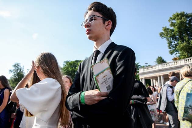 RUSSIA, ST PETERSBURG - JUNE 30, 2026: Young people attend an annual ball held at the Peterhof State Museum Reserve for school leavers awarded gold medals for academic excellence. Peter Kovalev TASS  94535102