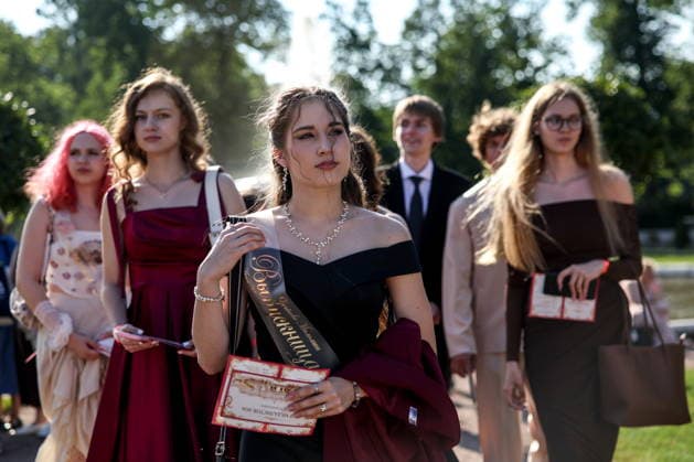 RUSSIA, ST PETERSBURG - JUNE 30, 2026: Young people attend an annual ball held at the Peterhof State Museum Reserve for school leavers awarded gold medals for academic excellence. Peter Kovalev TASS  94535107