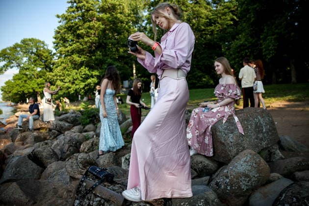 RUSSIA, ST PETERSBURG - JUNE 30, 2026: Young people attend an annual ball held at the Peterhof State Museum Reserve for school leavers awarded gold medals for academic excellence. Peter Kovalev TASS  94535167