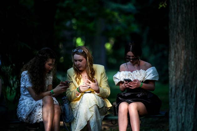 RUSSIA, ST PETERSBURG - JUNE 30, 2026: Young people attend an annual ball held at the Peterhof State Museum Reserve for school leavers awarded gold medals for academic excellence. Peter Kovalev TASS  94535172