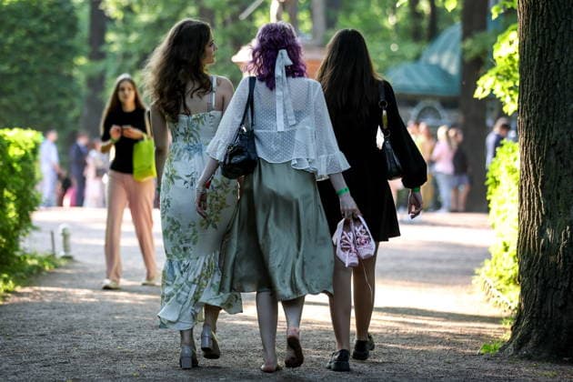 RUSSIA, ST PETERSBURG - JUNE 30, 2026: Young people attend an annual ball held at the Peterhof State Museum Reserve for school leavers awarded gold medals for academic excellence. Peter Kovalev TASS  94535174