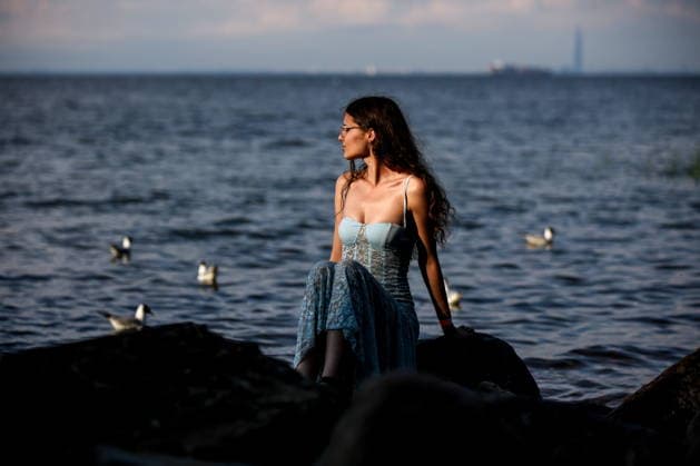 RUSSIA, ST PETERSBURG - JUNE 30, 2026: A girl poses during an annual ball held at the Peterhof State Museum Reserve for school leavers awarded gold medals for academic excellence. Peter Kovalev TASS  94535170
