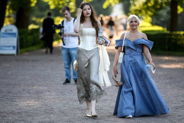 RUSSIA, ST PETERSBURG - JUNE 30, 2026: Young people attend an annual ball held at the Peterhof State Museum Reserve for school leavers awarded gold medals for academic excellence. Peter Kovalev TASS  94535255