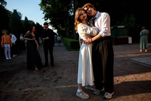 RUSSIA, ST PETERSBURG - JUNE 30, 2026: Young people attend an annual ball held at the Peterhof State Museum Reserve for school leavers awarded gold medals for academic excellence. Peter Kovalev TASS  94535258