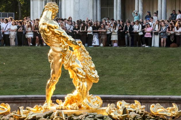RUSSIA, ST PETERSBURG - JUNE 30, 2026: Young people attend an annual ball held at the Peterhof State Museum Reserve for school leavers awarded gold medals for academic excellence. Peter Kovalev TASS  94535259