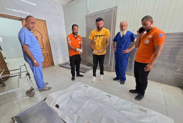 Unidentified remains transferred to Nasser Medical Complex in Khan Younis Ambulance crews transport the remains of an unidentified person to Nasser Medical Complex after they were recovered from the al-Amal neighborhood, north of Khan Younis in the southern Gaza Strip, on July 1, 2026. The remains were retrieved from the area before being transferred to the hospital for further procedures. Photo by Tariq Mohammad APA Images Khan Yunis Gaza Strip Palestinian Territory 010726_Khan_Yunis_TM_00(2) Copyright: xapaimagesxTariqxMohammad xapaimagesx