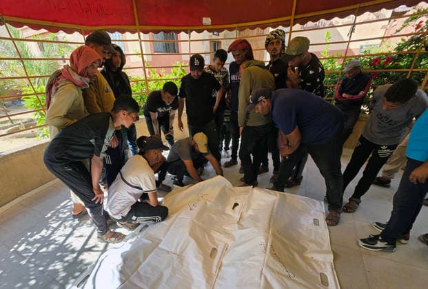 Mourners bid farewell to two Palestinians at Nasser Medical Complex Mourners bid farewell to the bodies of two Palestinians at Nasser Medical Complex in Khan Younis, southern Gaza Strip, on July 1, 2026, after they were killed in an Israeli airstrike that targeted a group of people near the Asdaa junction in the al-Mawasi area of Khan Younis the previous evening. Photo by Tariq Mohammad APA Images Khan Yunis Gaza Strip Palestinian Territory 010726_Khan_Yunis_TM_01(1) Copyright: xapaimagesxTariqxMohammad xapaimagesx