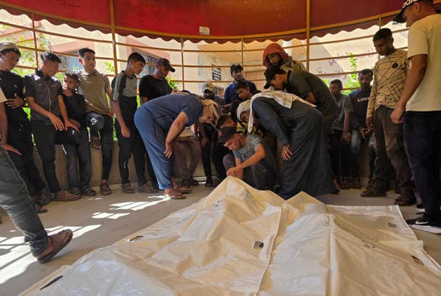 Mourners bid farewell to two Palestinians at Nasser Medical Complex Mourners bid farewell to the bodies of two Palestinians at Nasser Medical Complex in Khan Younis, southern Gaza Strip, on July 1, 2026, after they were killed in an Israeli airstrike that targeted a group of people near the Asdaa junction in the al-Mawasi area of Khan Younis the previous evening. Photo by Tariq Mohammad APA Images Khan Yunis Gaza Strip Palestinian Territory 010726_Khan_Yunis_TM_01(17) Copyright: xapaimagesxTariqxMohammad xapaimagesx
