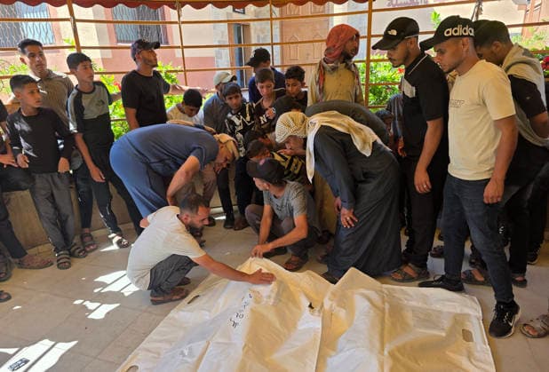 Mourners bid farewell to two Palestinians at Nasser Medical Complex Mourners bid farewell to the bodies of two Palestinians at Nasser Medical Complex in Khan Younis, southern Gaza Strip, on July 1, 2026, after they were killed in an Israeli airstrike that targeted a group of people near the Asdaa junction in the al-Mawasi area of Khan Younis the previous evening. Photo by Tariq Mohammad APA Images Khan Yunis Gaza Strip Palestinian Territory 010726_Khan_Yunis_TM_01(18) Copyright: xapaimagesxTariqxMohammad xapaimagesx