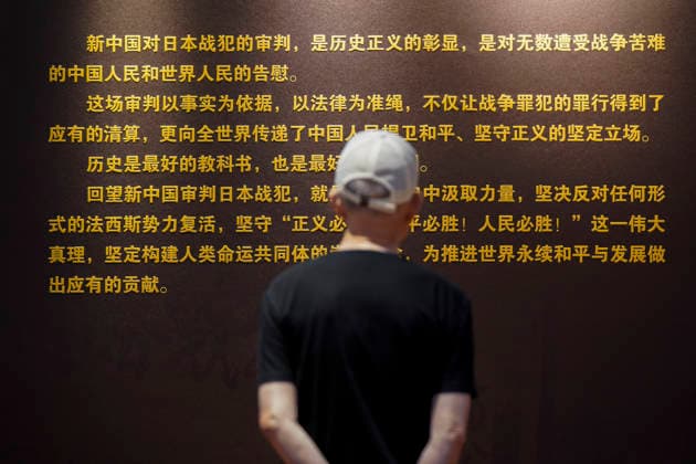 (260701) -- HARBIN, July 1, 2026 -- A man visits an exhibition on historical facts of trials of Japanese war criminals at the Exhibition Hall of Evidences of Crime Committed by Unit 731 of the Japanese Imperial Army in Harbin, northeast China s Heilongjiang Province, July 1, 2026. The exhibition opened on Wednesday in Harbin. ) CHINA-HEILONGJIANG-HARBIN-JAPANESE WAR CRIMINALS-TRIAL-EXHIBITION (CN) NaxYuqi 