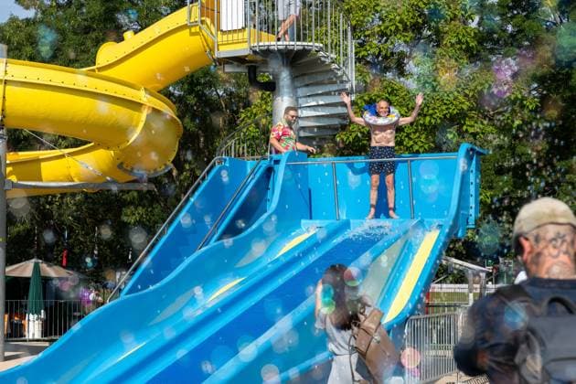 July 1, 2026, Breclav, South Moravia, Czech Republic: Breclav Mayor SVATOPLUK PECEK takes the first ride down a water slide during the reopening ceremony of the municipal outdoor swimming pool in Breclav, Czech Republic, on July 1, 2026. The outdoor facility reopened after approximately 18 months of construction as part of a CZK 530 million redevelopment project that also includes a new indoor swimming pool scheduled for completion in early 2027. Breclav Czech Republic - ZUMAc315 20260701_zsp_c315_025 Copyright: xMichaelxCabalx