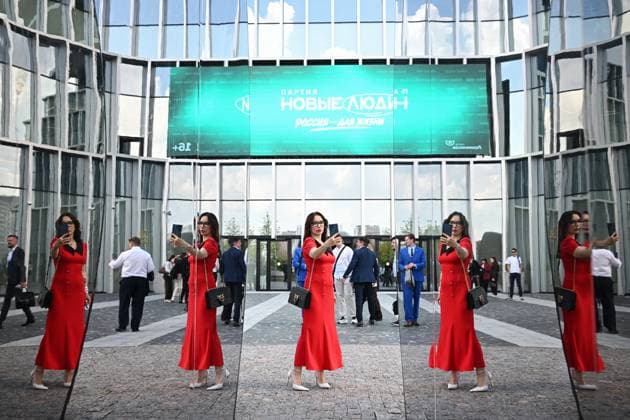 Russia New People Party Congress 9198232 01.07.2026 A woman takes a selfie outside the TAU concert hall, where the New People party congress is being held ahead of the Russian State Duma elections, in Moscow, Russia. Kristina Solovyova Sputnik Moscow Russia  Copyright: xKristinaxSolovyovax