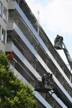 Firefighters pictured at the scene of a fire in an apartment building in the August Vermeylenlaan street in Antwerp on Wednesday 01 July 2026. According to the first information the fire broke out on the eighth level of the 10-floor building.  JONASxROOSENS 180075676