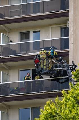 Firefighters pictured at the scene of a fire in an apartment building in the August Vermeylenlaan street in Antwerp on Wednesday 01 July 2026. According to the first information the fire broke out on the eighth level of the 10-floor building.  JONASxROOSENS 180080786