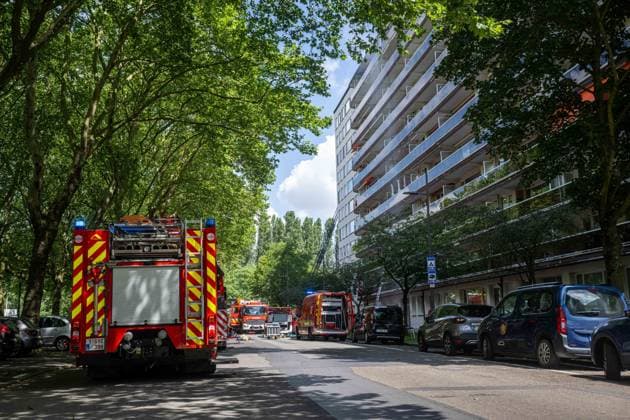 Firefighters pictured at the scene of a fire in an apartment building in the August Vermeylenlaan street in Antwerp on Wednesday 01 July 2026. According to the first information the fire broke out on the eighth level of the 10-floor building.  JONASxROOSENS 180080794