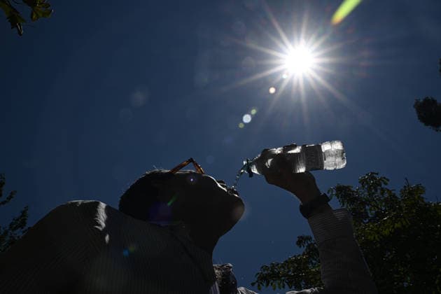 Heatwave in Madrid MADRID, SPAIN - JULY 1: A woman drinks a water as people spend time at Retiro Park to seek relief from temperatures exceeding 40 degrees in Madrid, Spain on July 1, 2026. Burak Akbulut Anadolu Madrid Spain. Editorial use only. Please get in touch for any other usage.  Copyright: x2026xAnadoluxBurakxAkbulutx