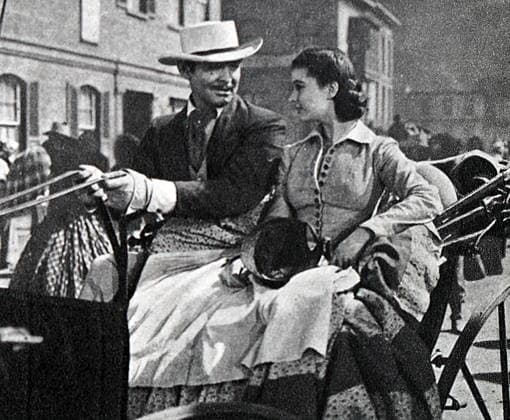RECORD DATE NOT STATED Film still of Clark Gable and Vivian Leigh from Gone with the Wind Film still of Clark Gable (1901-1960) and Vivian Leigh (1913-1967) from Gone with the Wind . Editorial use only. All other uses to be cleared with the copyright owner (World History Archive), in advance., WHA_151_0008.jpg, Clark Gable; Vivian Leigh; Gone with the Wind; film still; classic Hollywood; actors; vintage; 1930s; iconic; romance; drama; historical film; Hollywood legends; black and white; famous movie; Southern belle; leading man; Hollywood stars; classic cinema; Golden Age of Hollywood; Civil War era; American film; historical romance; Hollywood glamour; film characters; Scarlett O Hara; Rhett Butler; film scene; Hollywood history; film i Copyright: xWorldxHistoryxArchivex