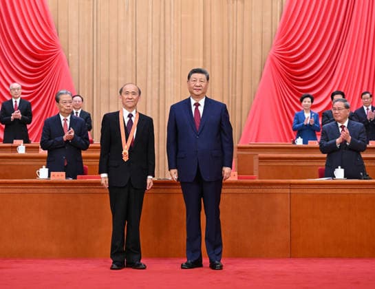 (260701) -- BEIJING, July 1, 2026 -- Chinese President Xi Jinping, also general secretary of the Communist Party of China (CPC) Central Committee and chairman of the Central Military Commission, confers the July 1 Medal, the Party s highest honor, on Ma Shanxiang in Beijing, capital of China, July 1, 2026. A gathering marking the CPC s 105th founding anniversary was held at the Great Hall of the People in Beijing on Wednesday. ) CHINA-BEIJING-CPC-105TH FOUNDING ANNIVERSARY-GATHERING (CN) YanxYan 